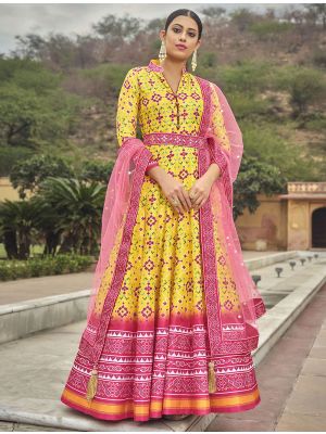 yellow dola silk patola print readymade gown with dupatta fabgo20168