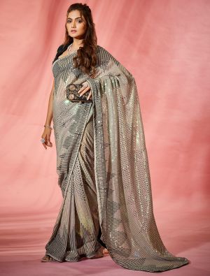 Imperial Cream Georgette Party Wear Saree With Sequins