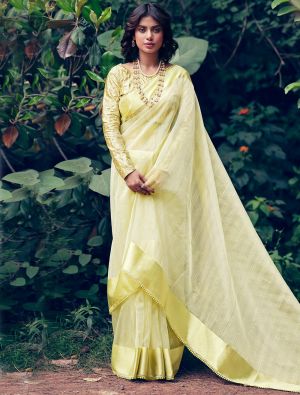 Light Yellow Organza Saree With Embroidered Satin Blouse