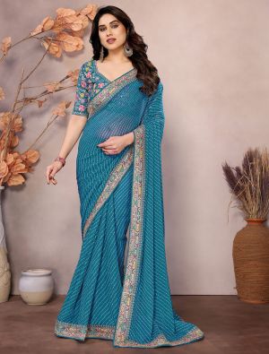 Teal Georgette Printed Saree With Embroidery