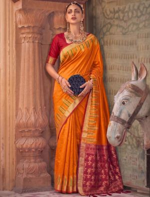 Saffron Orange Soft Art Silk Traditional Saree With Zari Work FABSA23093